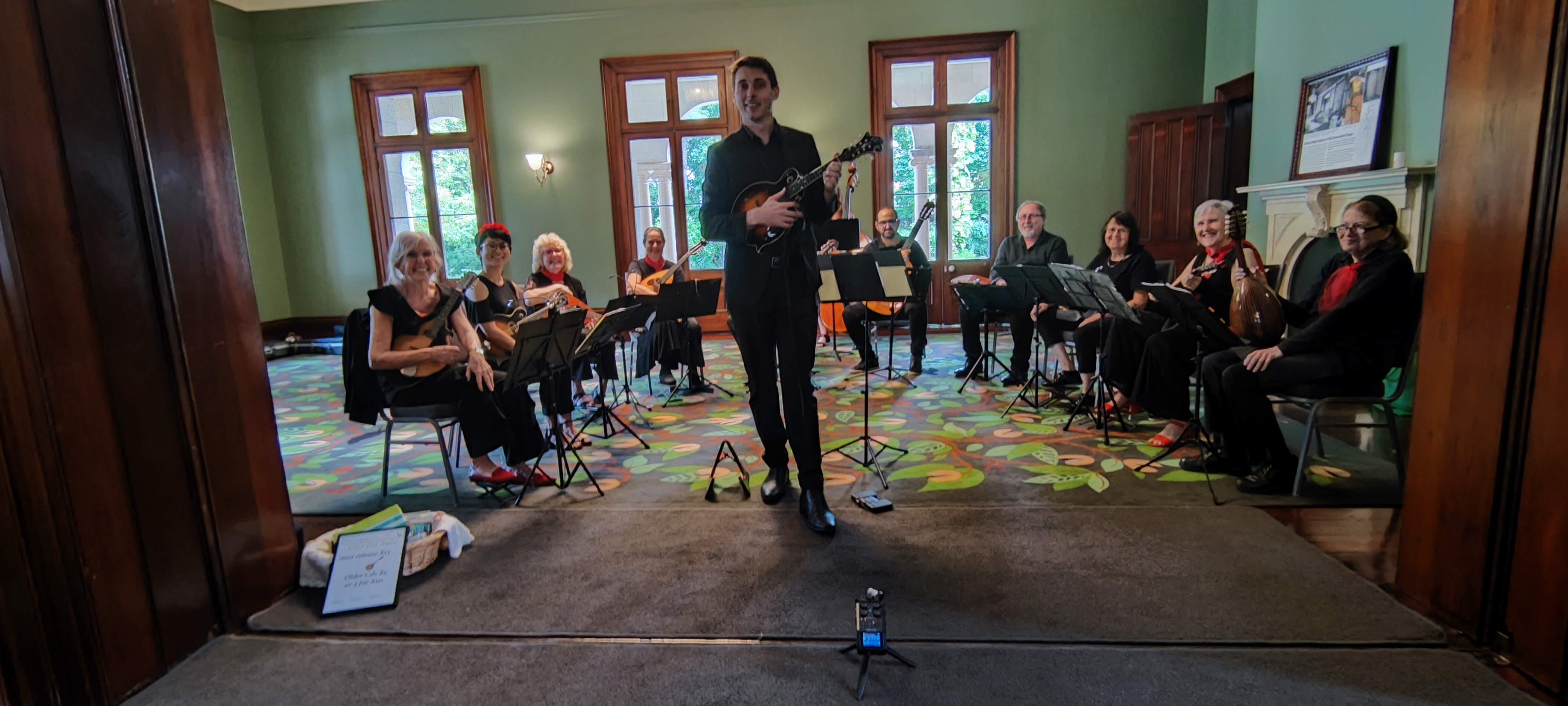 A mandolin band posing in Old Government House