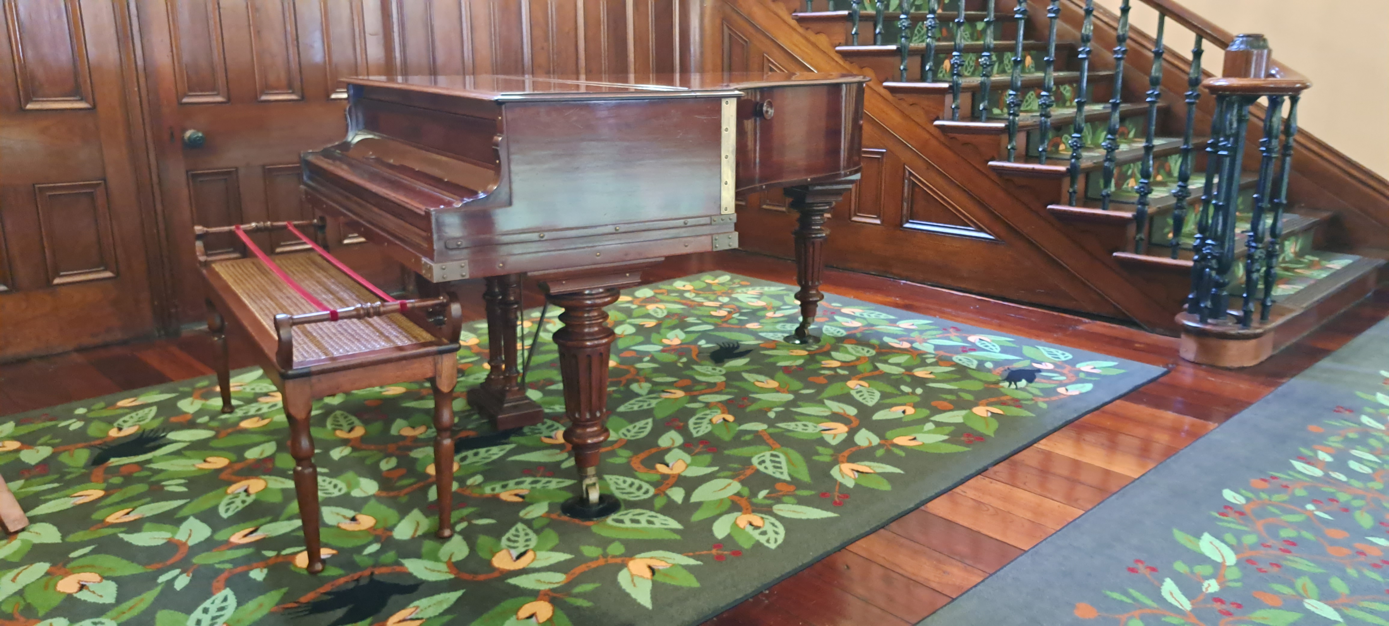 Miniature grand piano made from mahogany wood